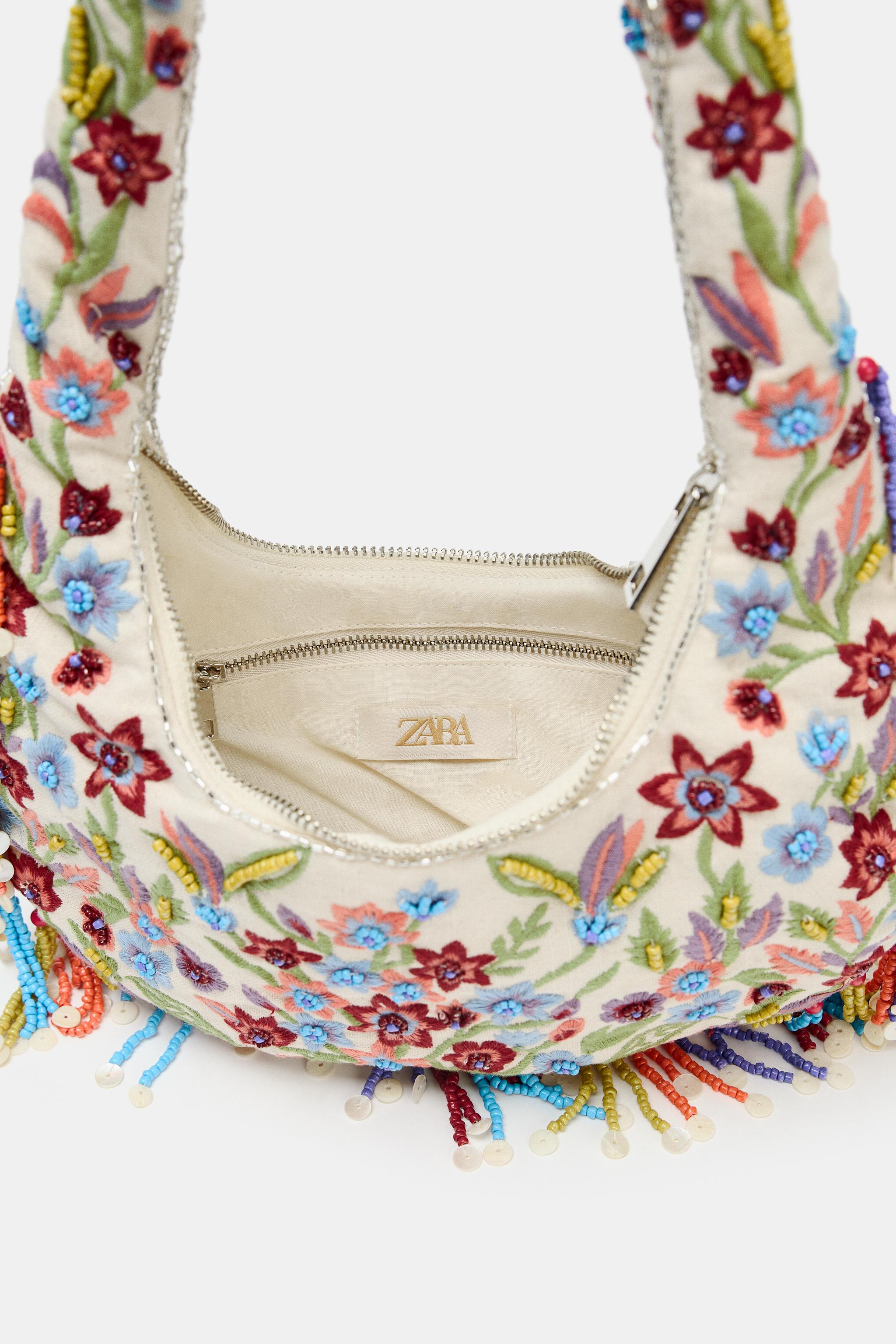 OVAL BAG WITH FLORAL EMBROIDERY